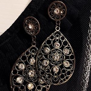 Earrings pierced with faux diamonds